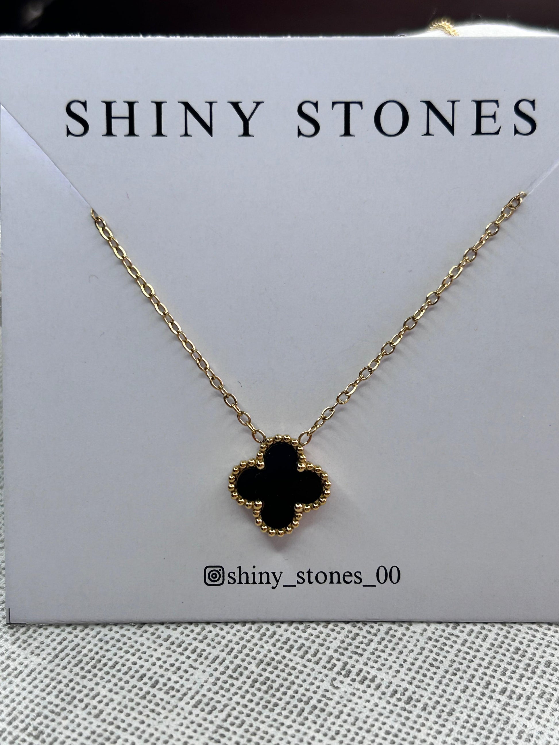 Black clover necklace