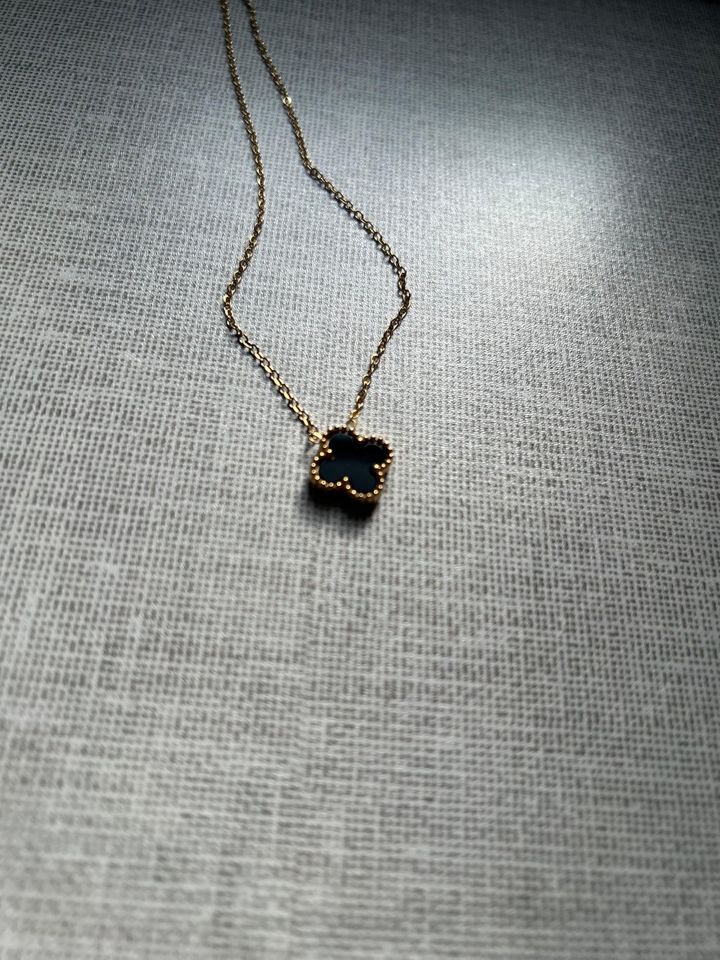 Black clover necklace