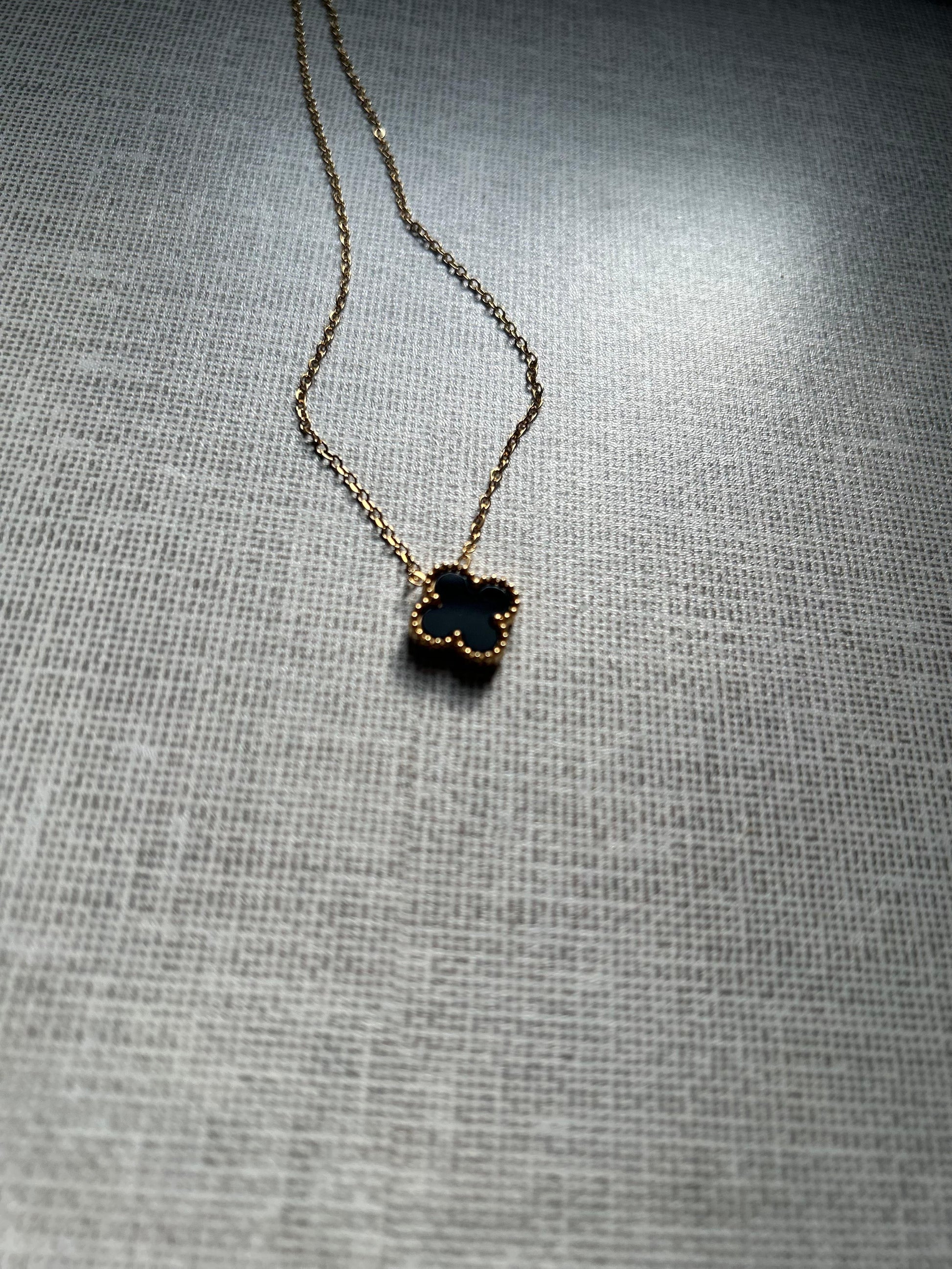 Black clover necklace