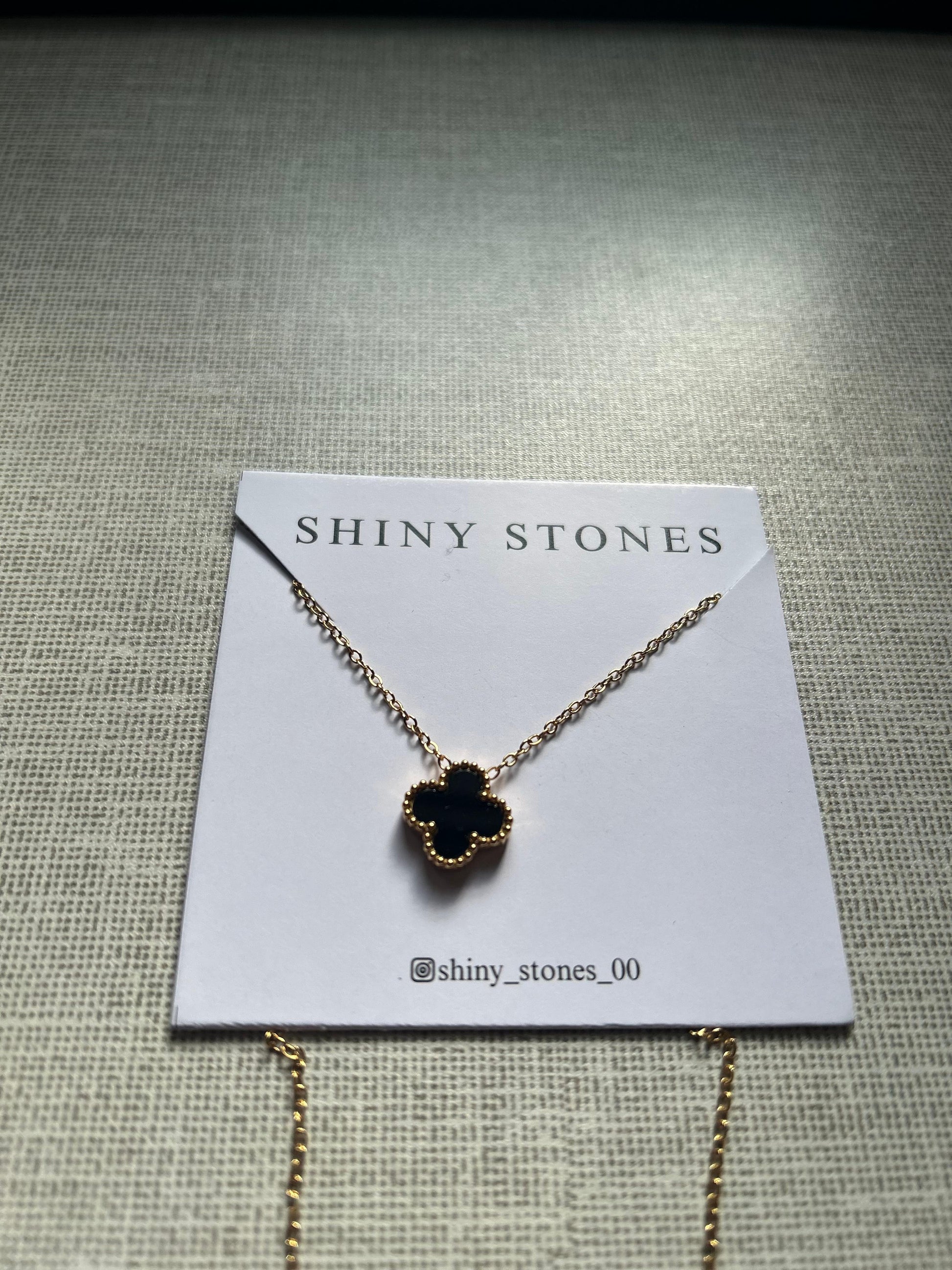 Black clover necklace