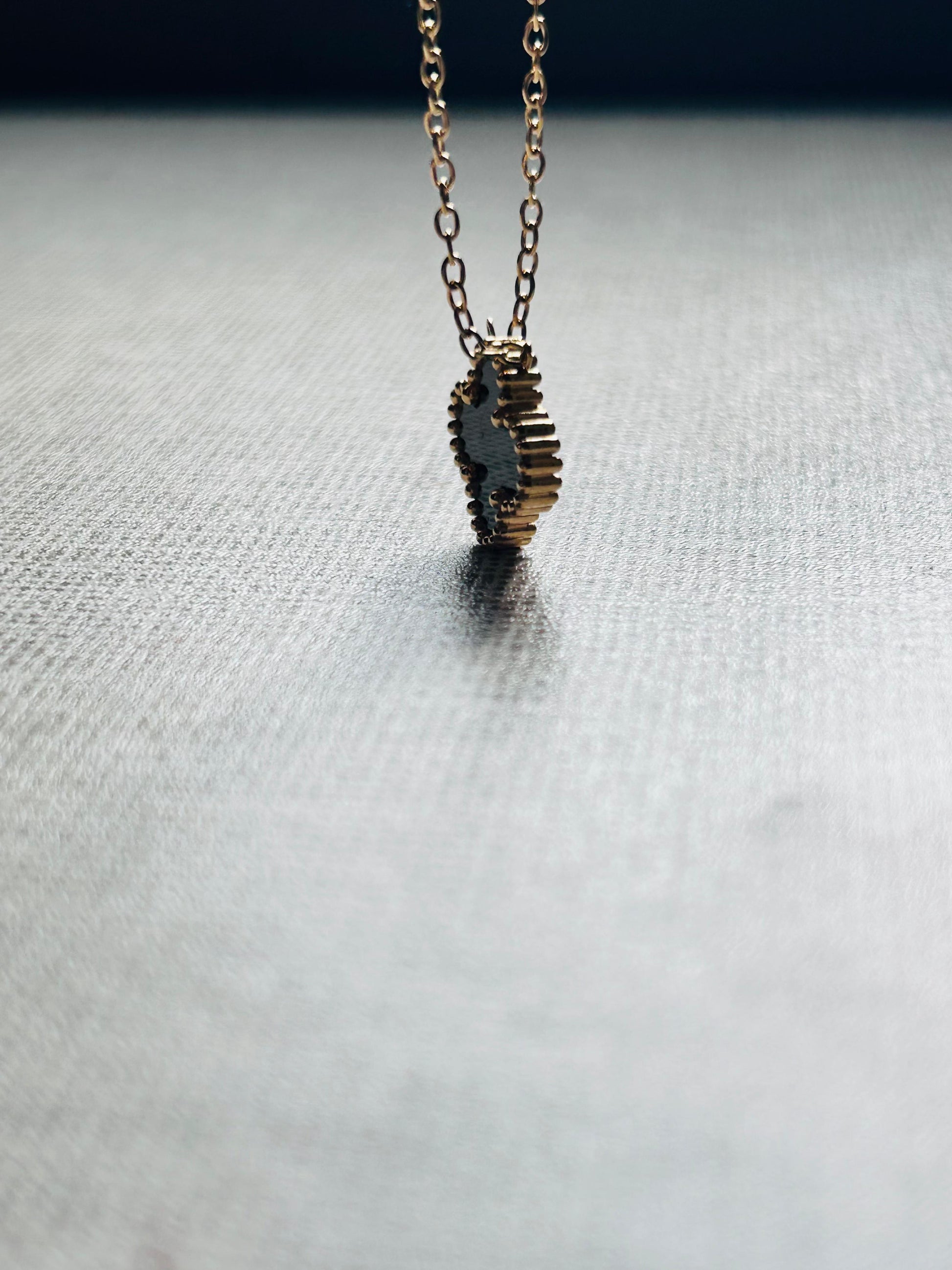 Black clover necklace